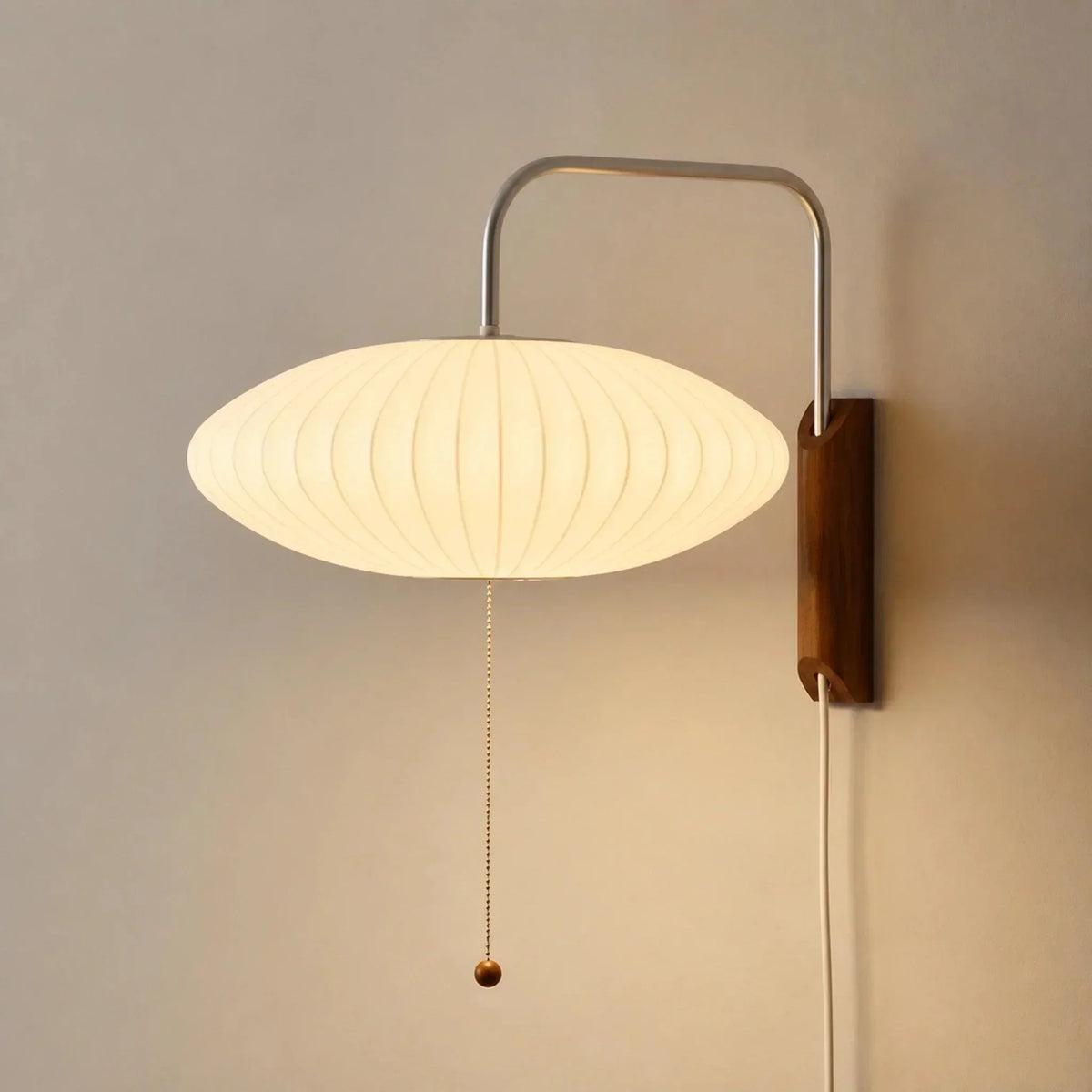 Wide flattened ribbed shade wall light