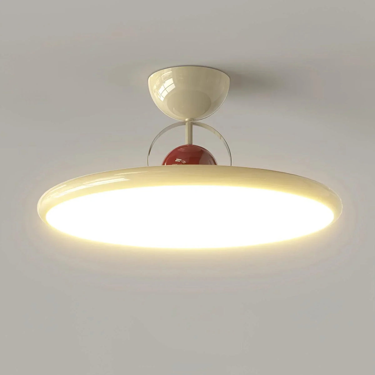 Beige disc-shade LED ceiling light close-up
