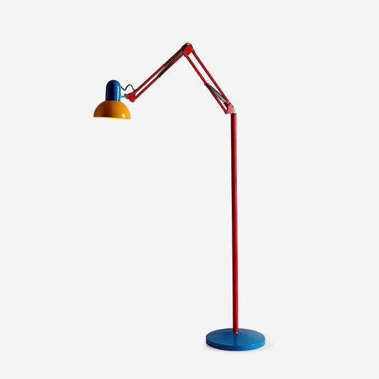 Memphis-style floor lamp with red arm, yellow shade and blue base