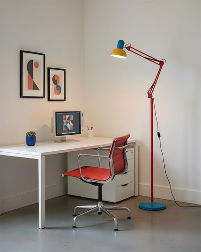 Colourful floor lamp beside a desk