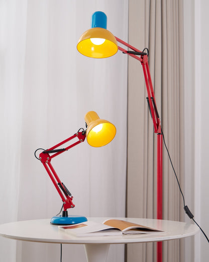 Matching floor and table lamps with red arms and yellow shades