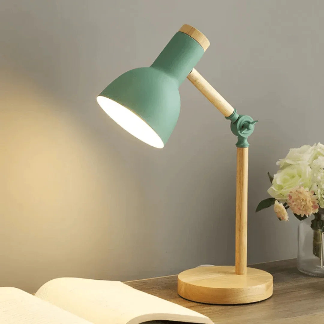 Mint green pivoting desk lamp close-up