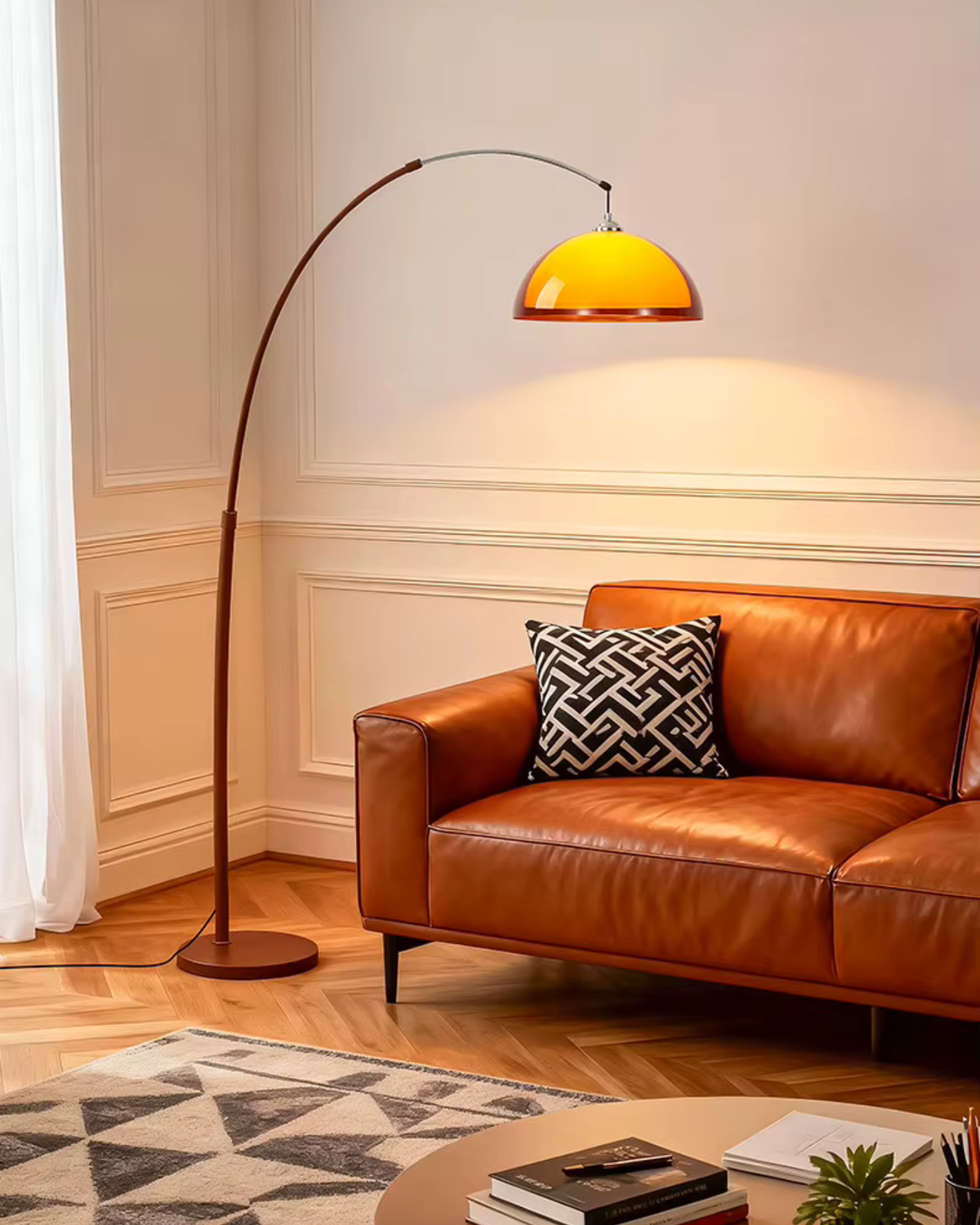 Arc standing lamp with adjustable arm and amber shade