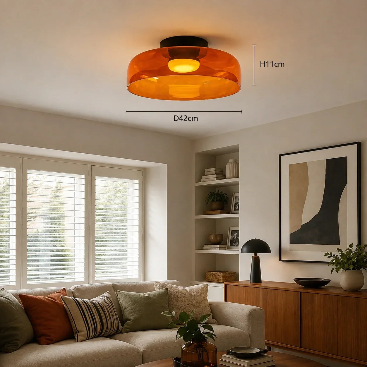 An amber Art Deco glass ceiling light surface-mounted in a modern living room, with dimensions of 42cm diameter and 11cm height.