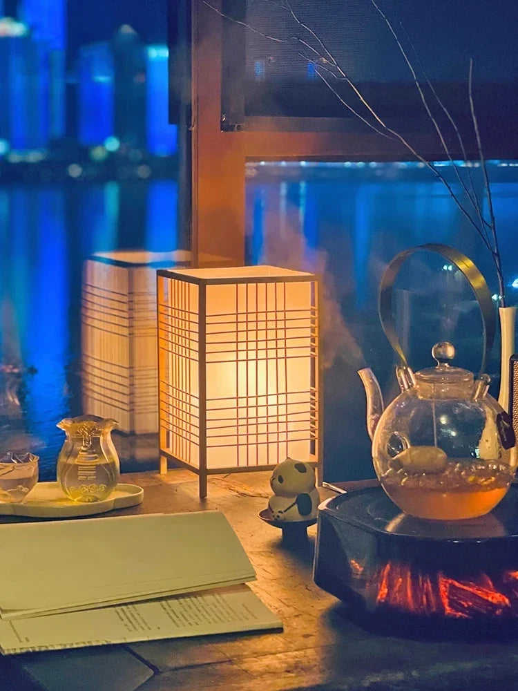 Bamboo grid table lamp in a tea table setting