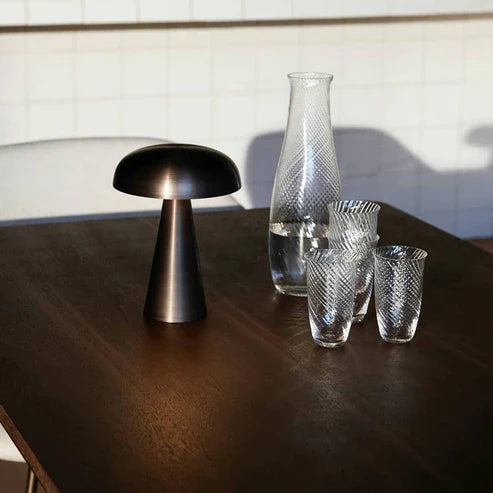 Black battery lamp on a dining table