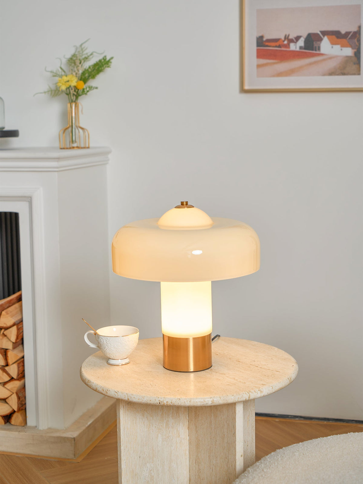 Illuminated beige glass lamp near a fireplace