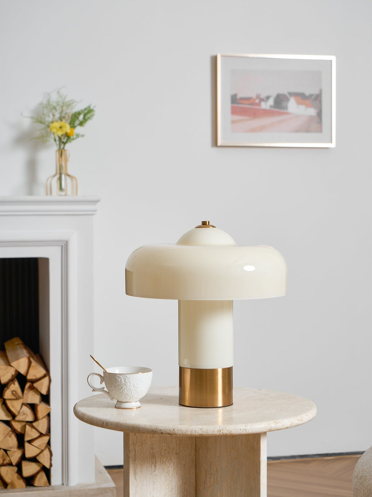 Unlit beige glass lamp near a fireplace