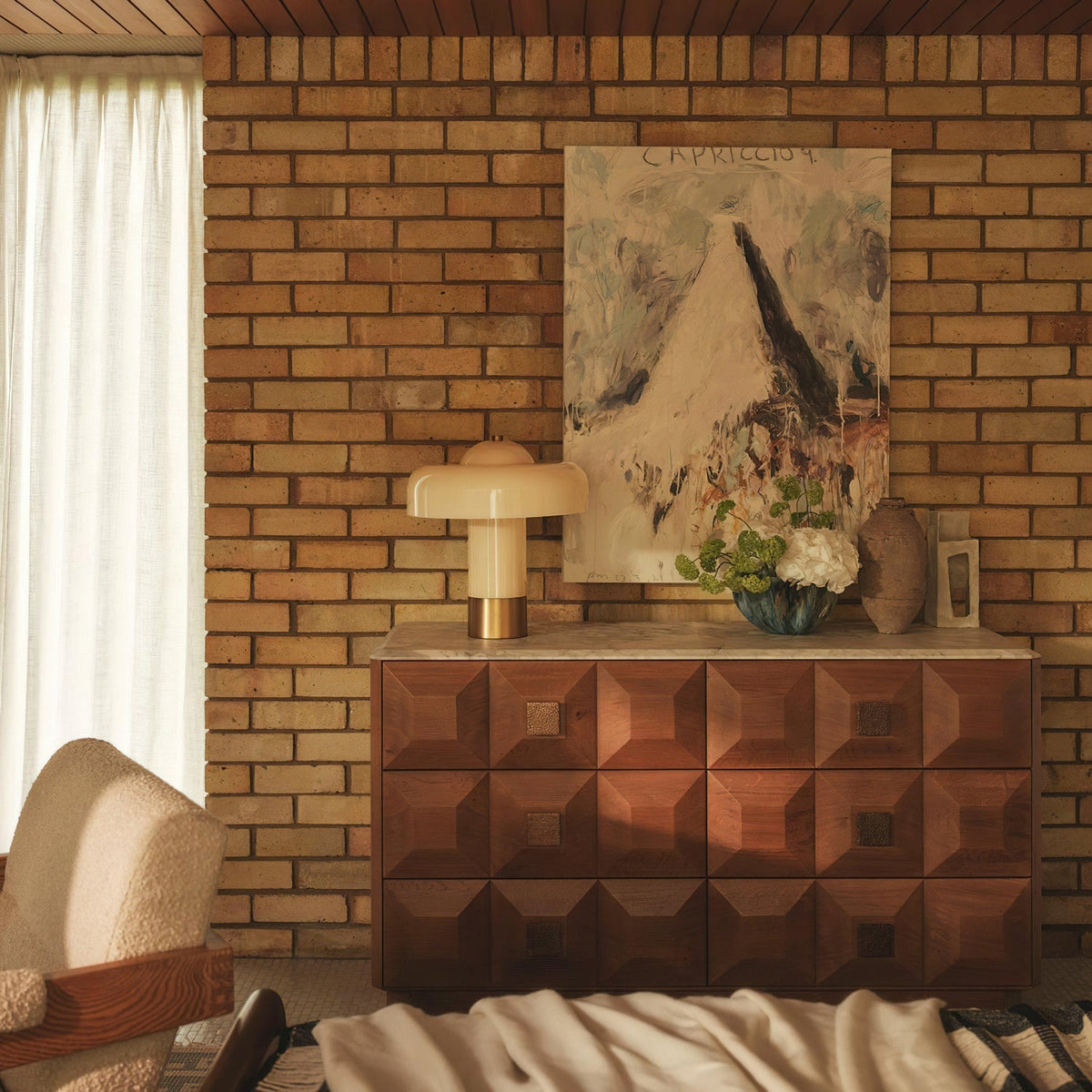 Beige lamp on a patterned timber cabinet