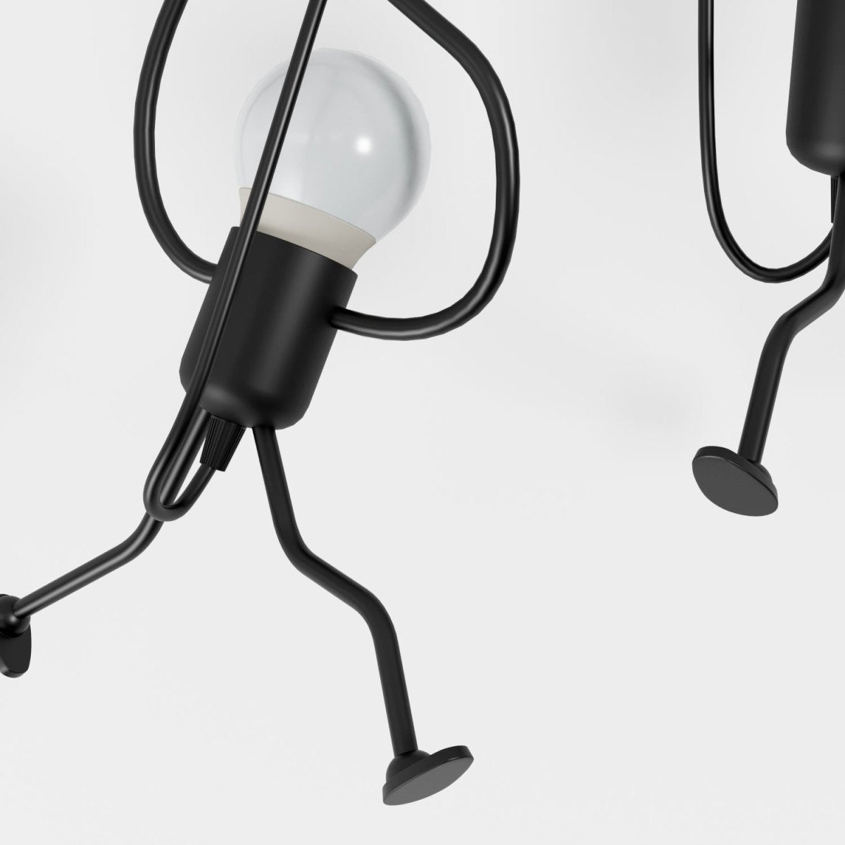 Close view of iron figure and bulb