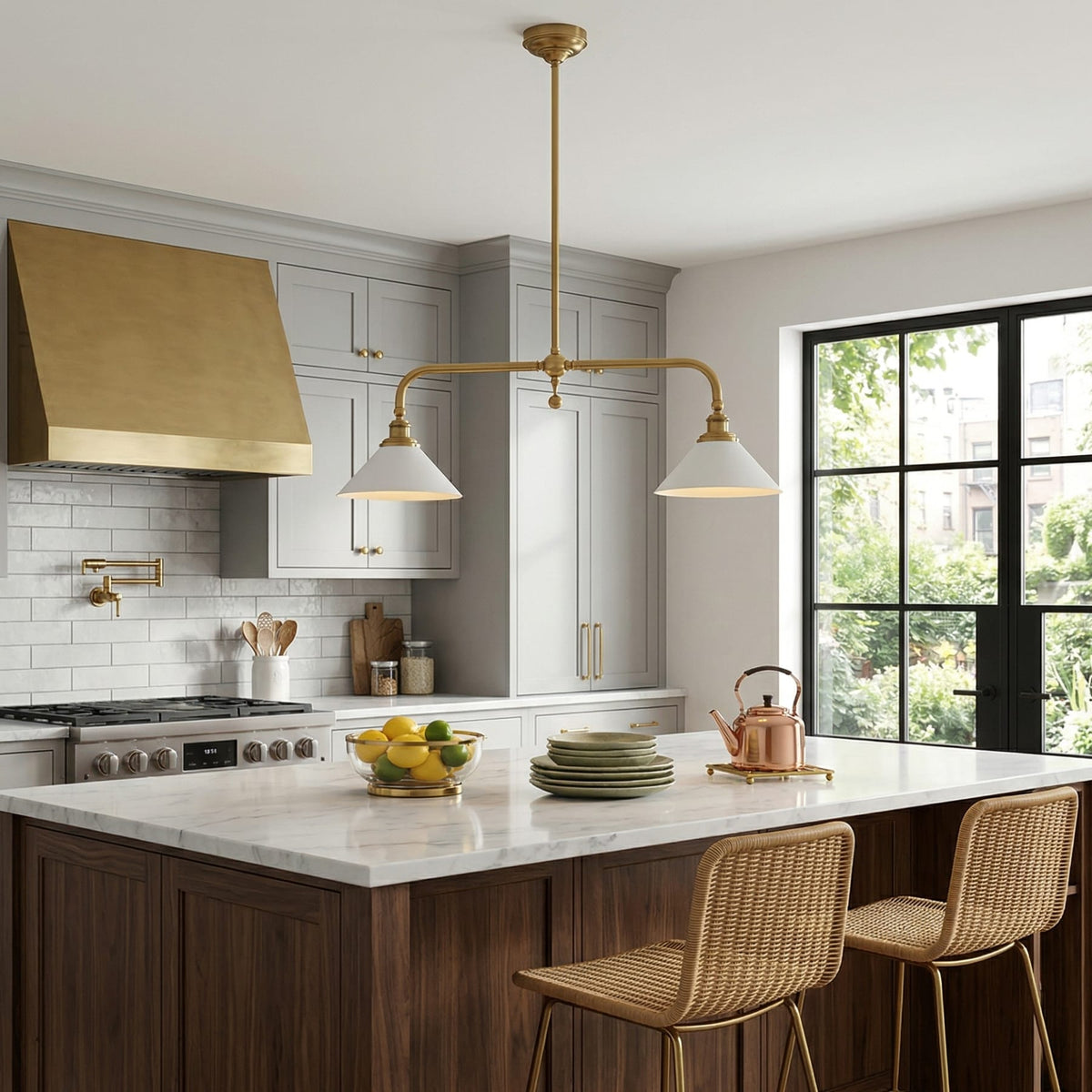 Brass ceramic pendant above an island with woven stools