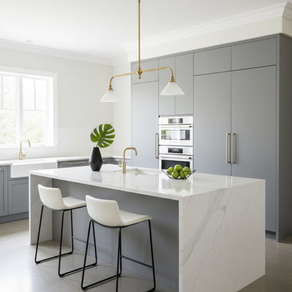 Two ceramic shades above a white kitchen island