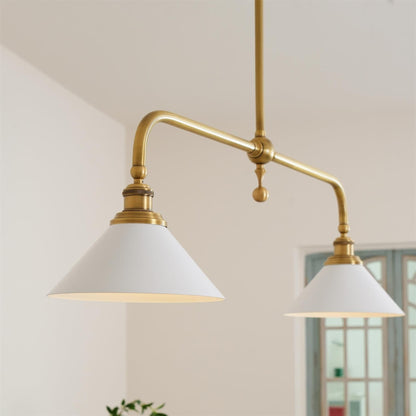 White ceramic shades on a curved brass pendant frame