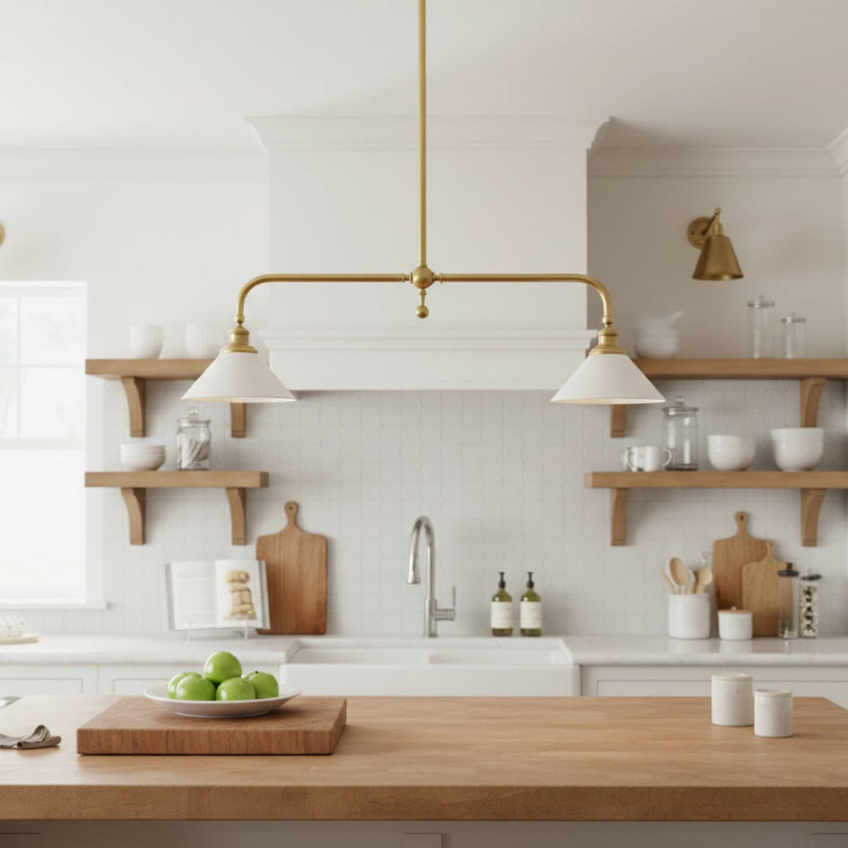 Two ceramic pendant shades in a white kitchen