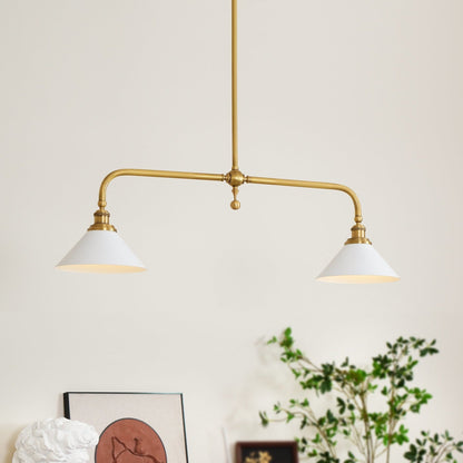 Illuminated two-light ceramic pendant above a cabinet