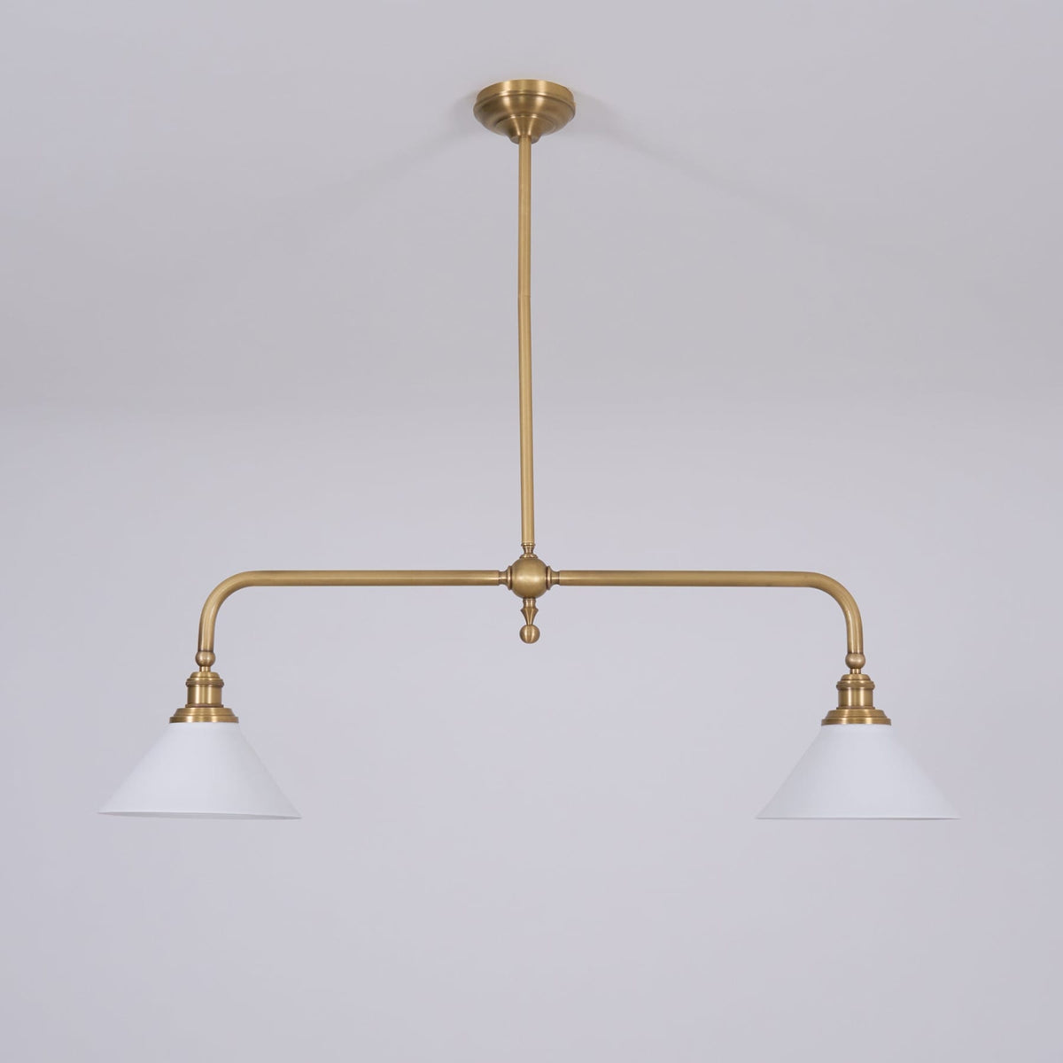 Front view of brass frame and two ceramic shades