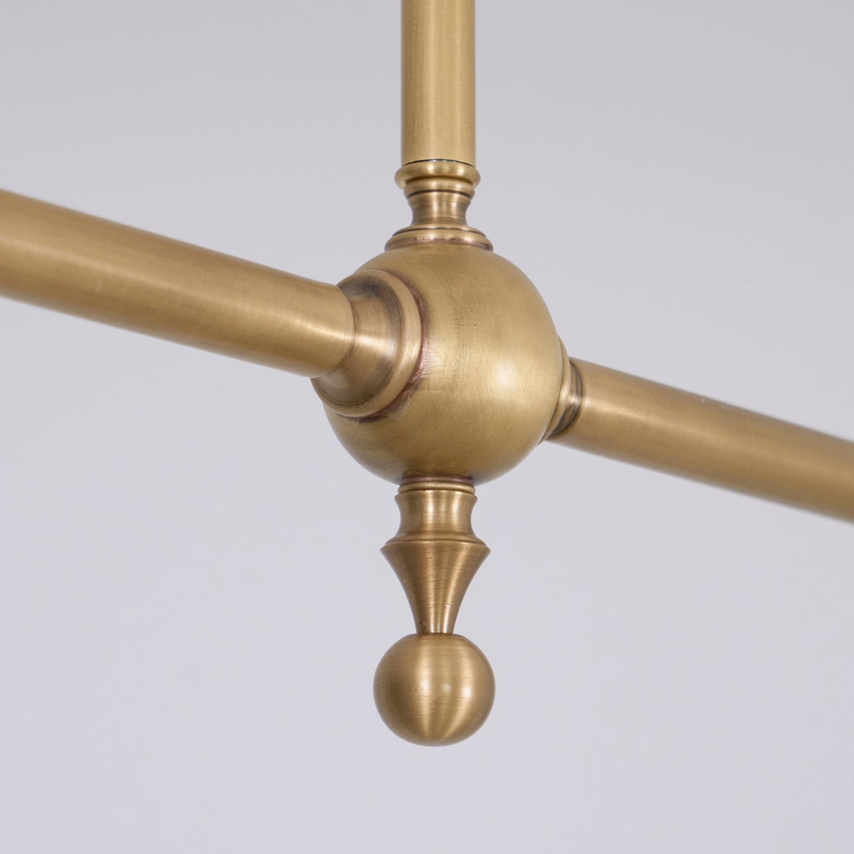 Central brass joint and decorative finial