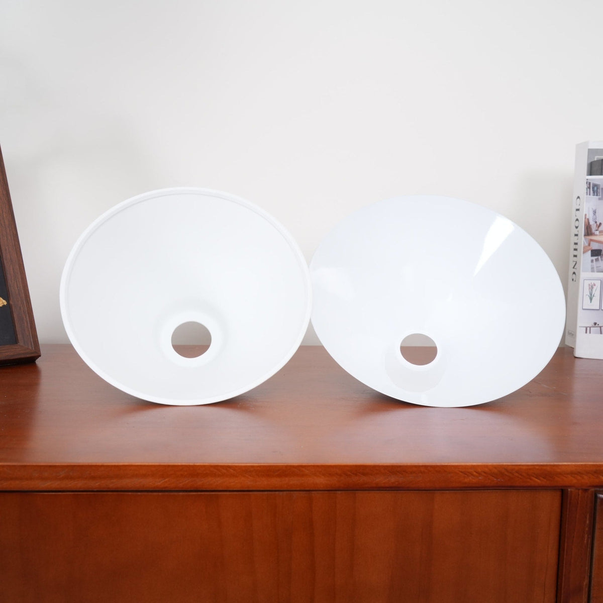 Two white ceramic shades viewed from inside