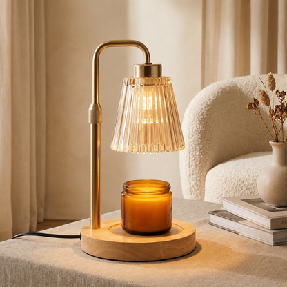 Brushed gold candle warmer lamp with natural wood base and ribbed glass shade