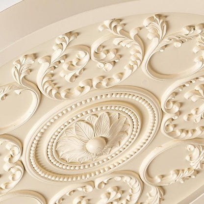 Close-up of carved rosette and scroll detailing