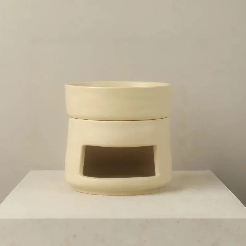 Oat coloured ceramic oil burner