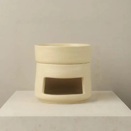 Oat coloured ceramic oil burner