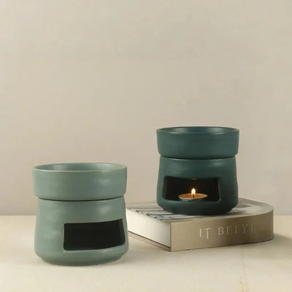 Green ceramic wax melt burners displayed together