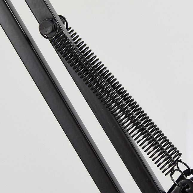 Spring-balanced black swing arm