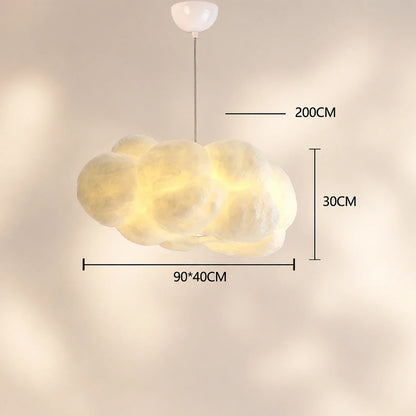 A sculptural cloud pendant light with dimensions shown, featuring a soft glowing finish, hanging from a ceiling rose with an adjustable cable length.