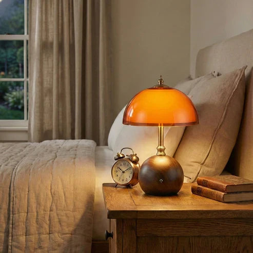 Rechargeable dome lamp on a bedside table