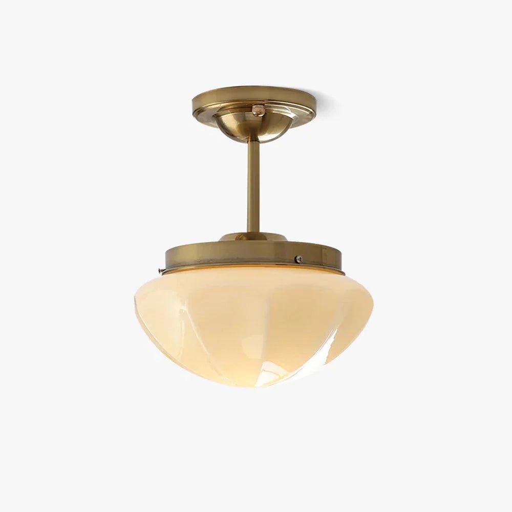 Gold compact semi-flush ceiling light with a faceted bowl shade