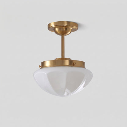 Gold long-stem ceiling light with a white faceted shade