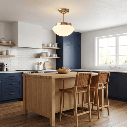Compact gold ceiling light with a faceted shade in a kitchen