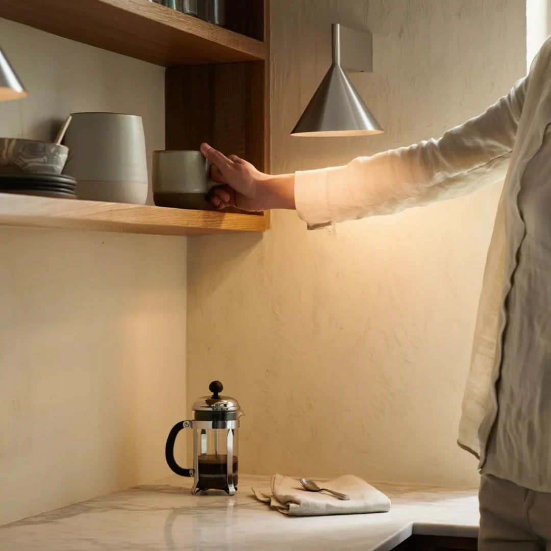 Aluminum cone wall sconce in a kitchen