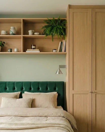 Aluminum wall sconces in a bedroom