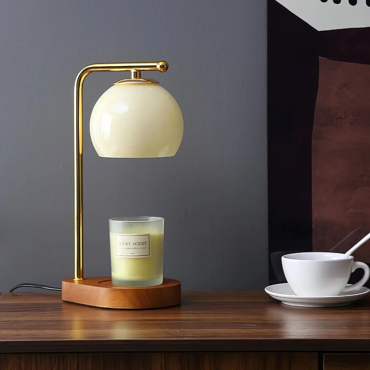 Cream glass candle warmer with a dark base