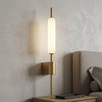 Double-head copper bedside wall light in an interior setting