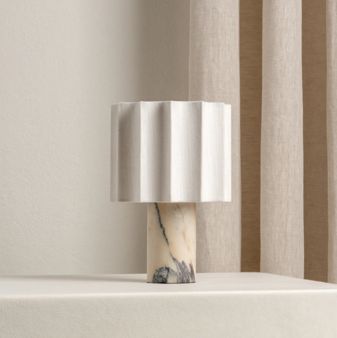 Calacatta marble table lamp with a neutral linen shade