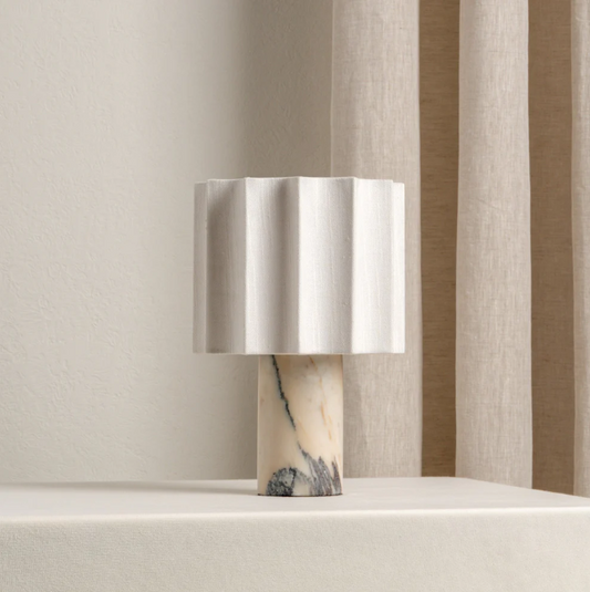 Calacatta marble table lamp with a neutral linen shade