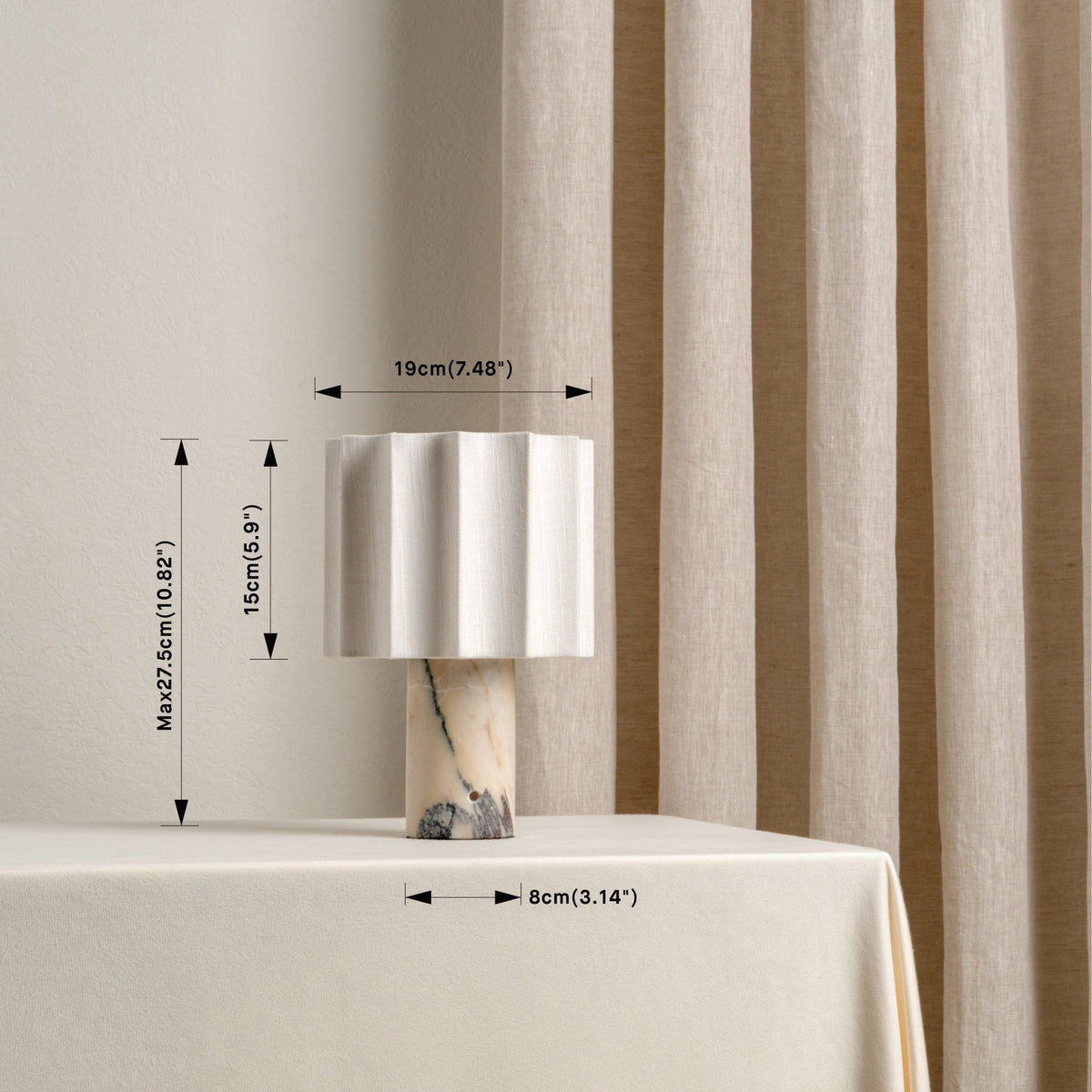 Marble table lamp measuring up to 27.5 cm high with a 19 cm shade
