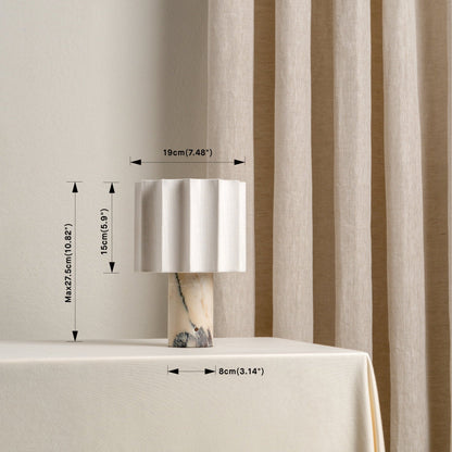Marble table lamp measuring up to 27.5 cm high with a 19 cm shade