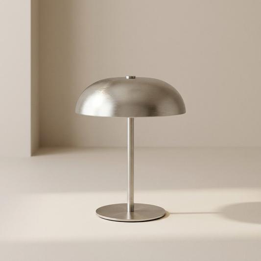 Silver cordless metal table lamp with dome shade