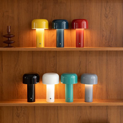 Colourful mushroom table lamps on shelves