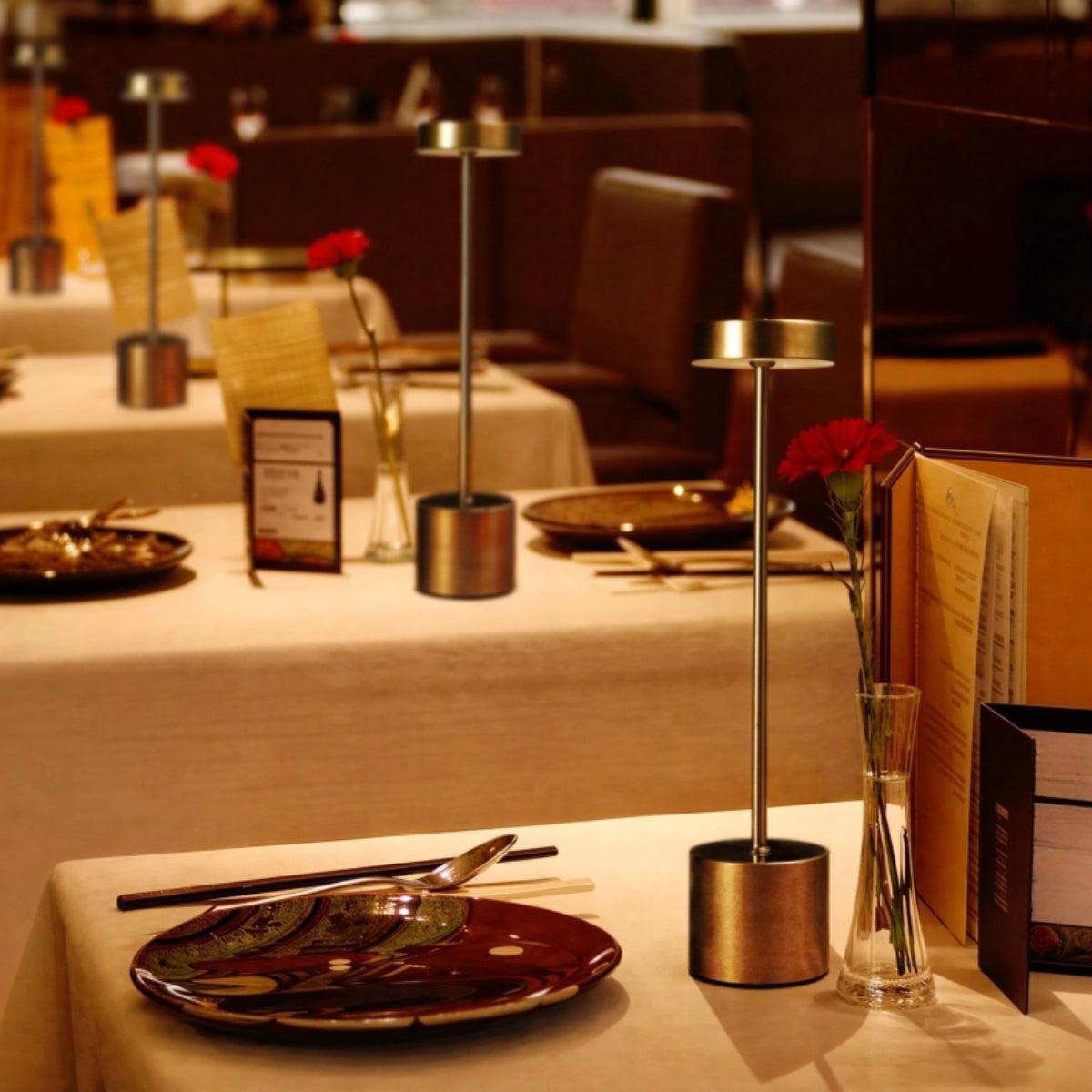 Rechargeable table lamps illuminating restaurant dining tables
