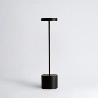 Black rechargeable table lamp with a slim stem and cylindrical base