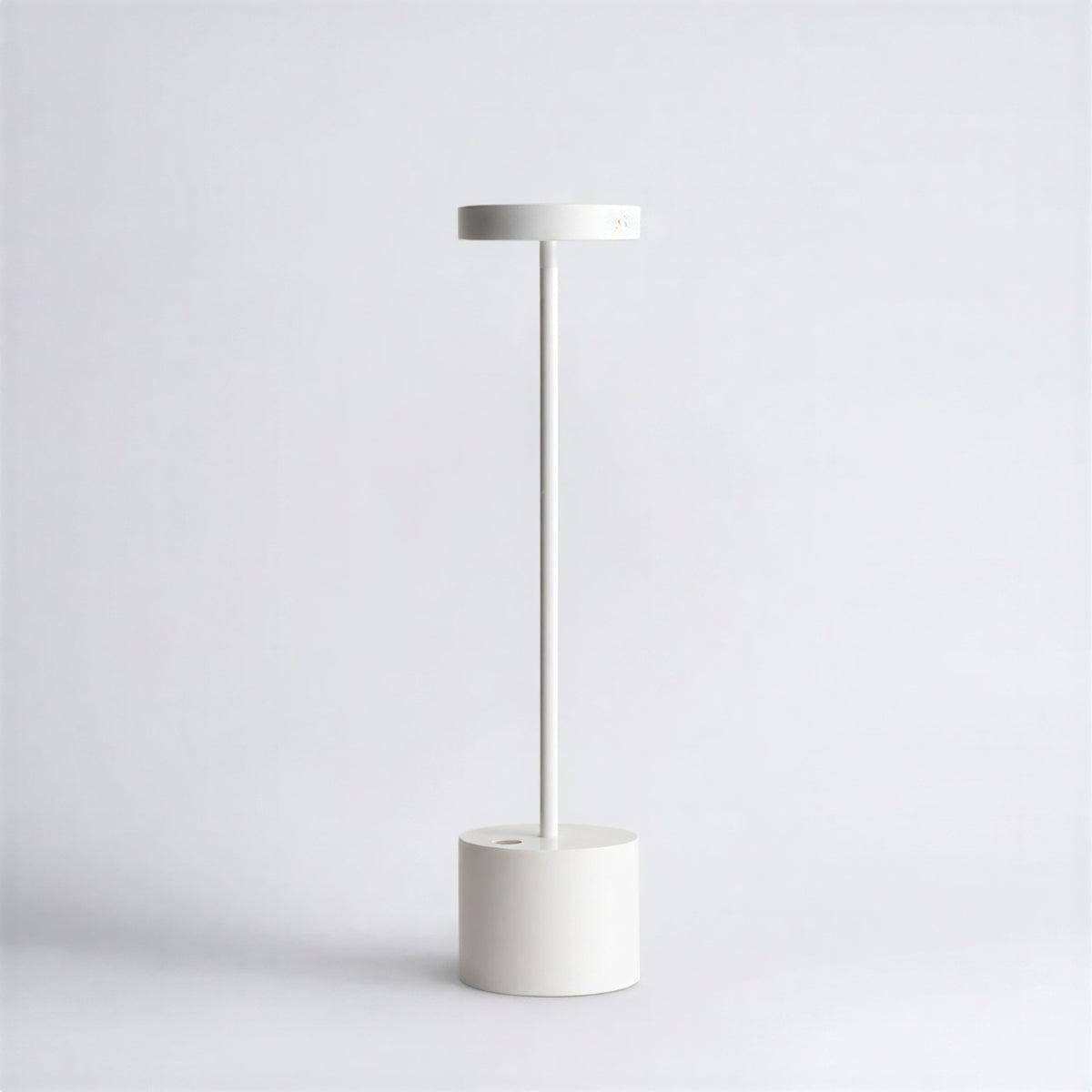 White rechargeable table lamp with a slim stem