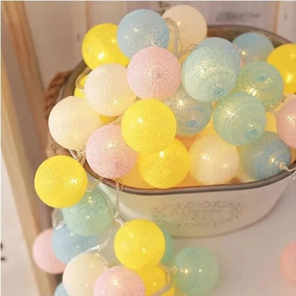 Pastel cotton ball lights piled in a bowl