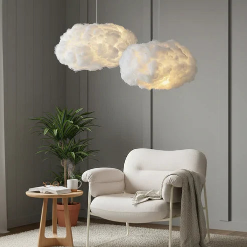 Cloud pendant lights beside an armchair
