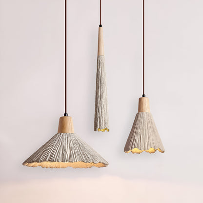 Cream textured pendant designs with warm light