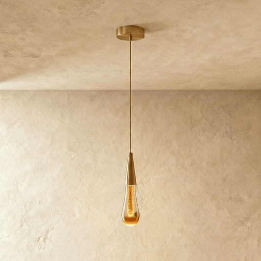 Single crystal teardrop pendant with gold-tone frame